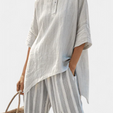 Daisy Szett Aszimmetrikus Pólóval és Csíkos Nadrággal a Modern és Elegáns Stílusért